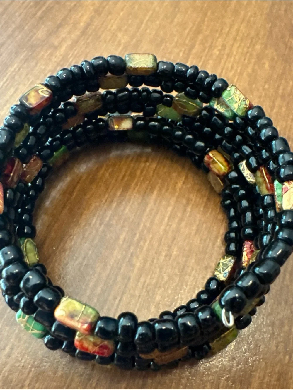 Handcrafted Black Beaded Coil Bracelet with Multicolor Accent Beads